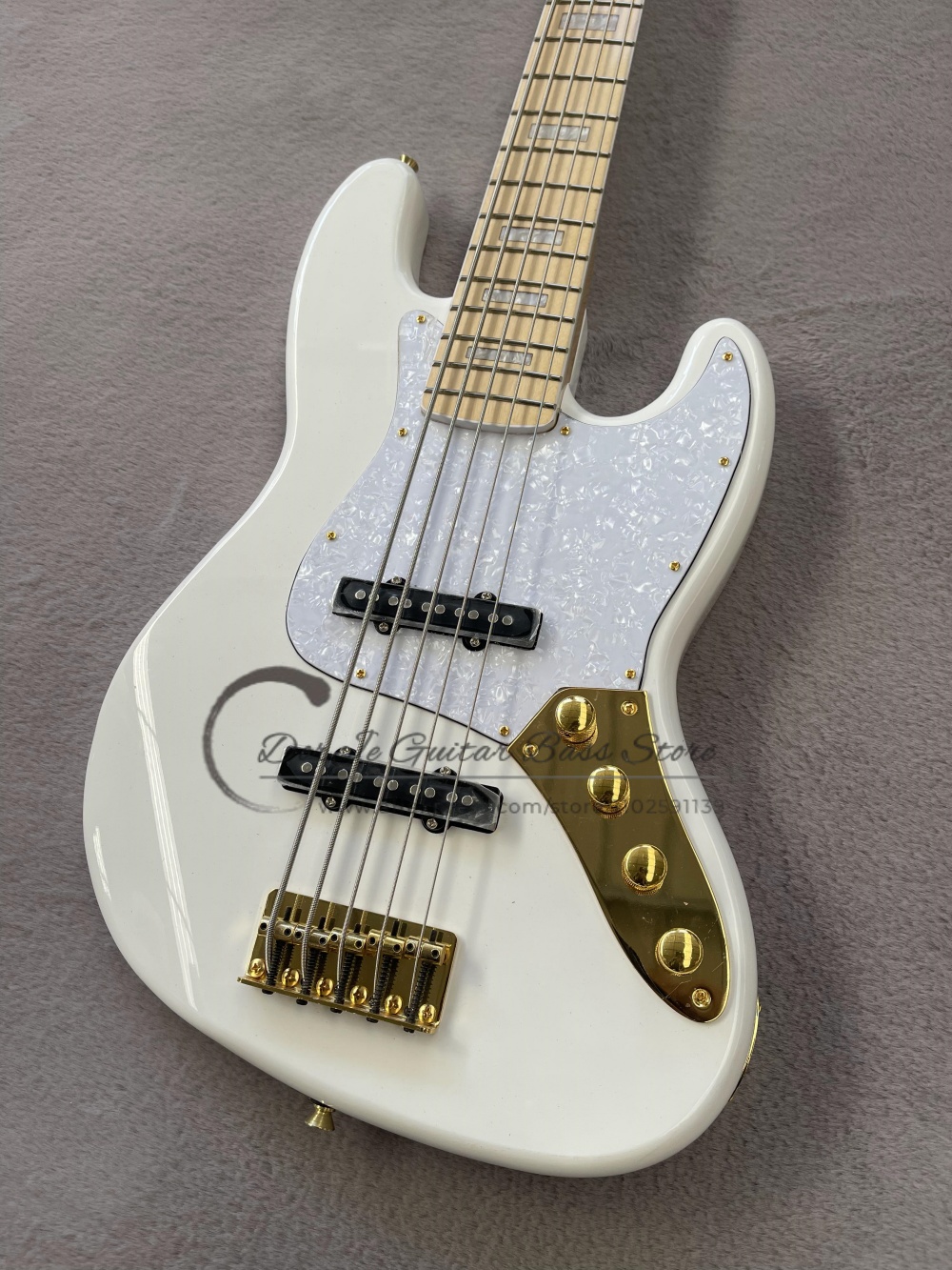 5 أوتار بيضاء باس، جسر ذهبي ثا - مراجعة Bass Guitar Fretless وسعره